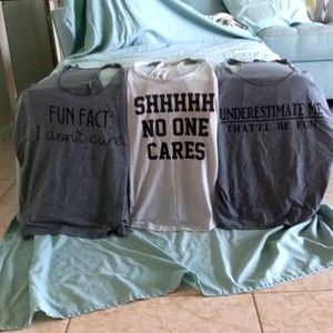 THREE Novelty racerback tank tops, size large
